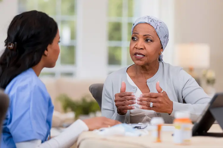 Patient consulting healthcare professional