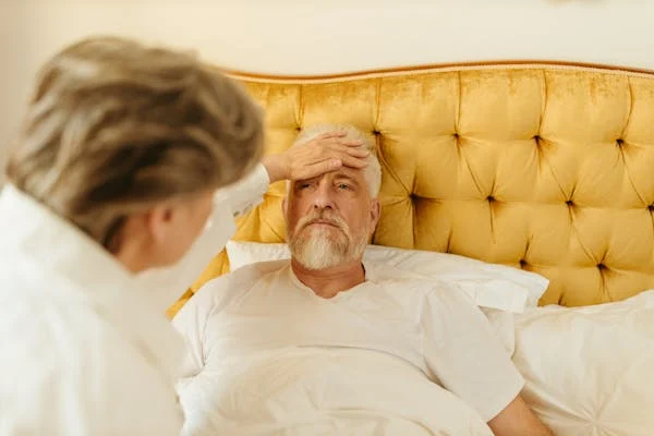 Elderly patient resting in bed